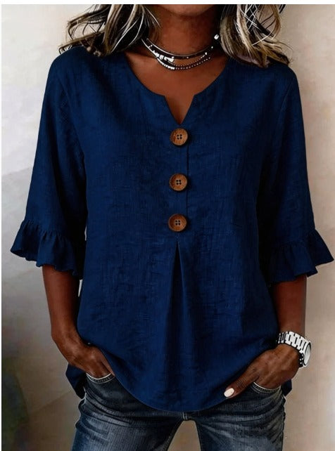 Blusa Inés de algodón-lino lisa con botones de madera y volantes
