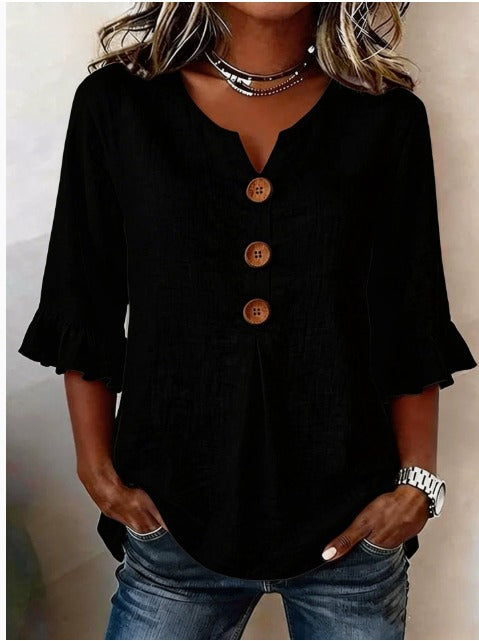 Blusa Inés de algodón-lino lisa con botones de madera y volantes